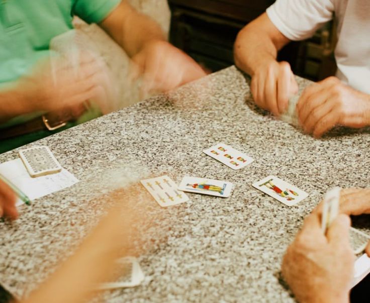Neapolitan cards on a café table